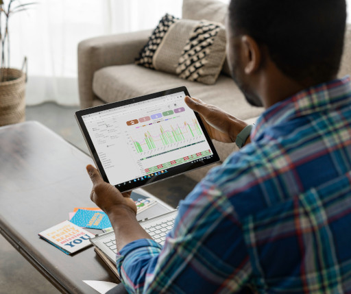 a man using his tablet to interface with the cerv-ice app and view indoor air quality data